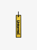 UNTAMED YELLOW JET TAG